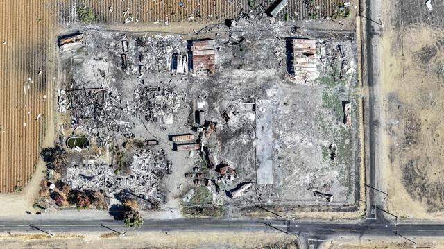 A composite image of drone photographs taken on Sept. 11, 2025, shows the remains of the Esparto fireworks explosion site a few months after the blast killed seven workers at the facility.